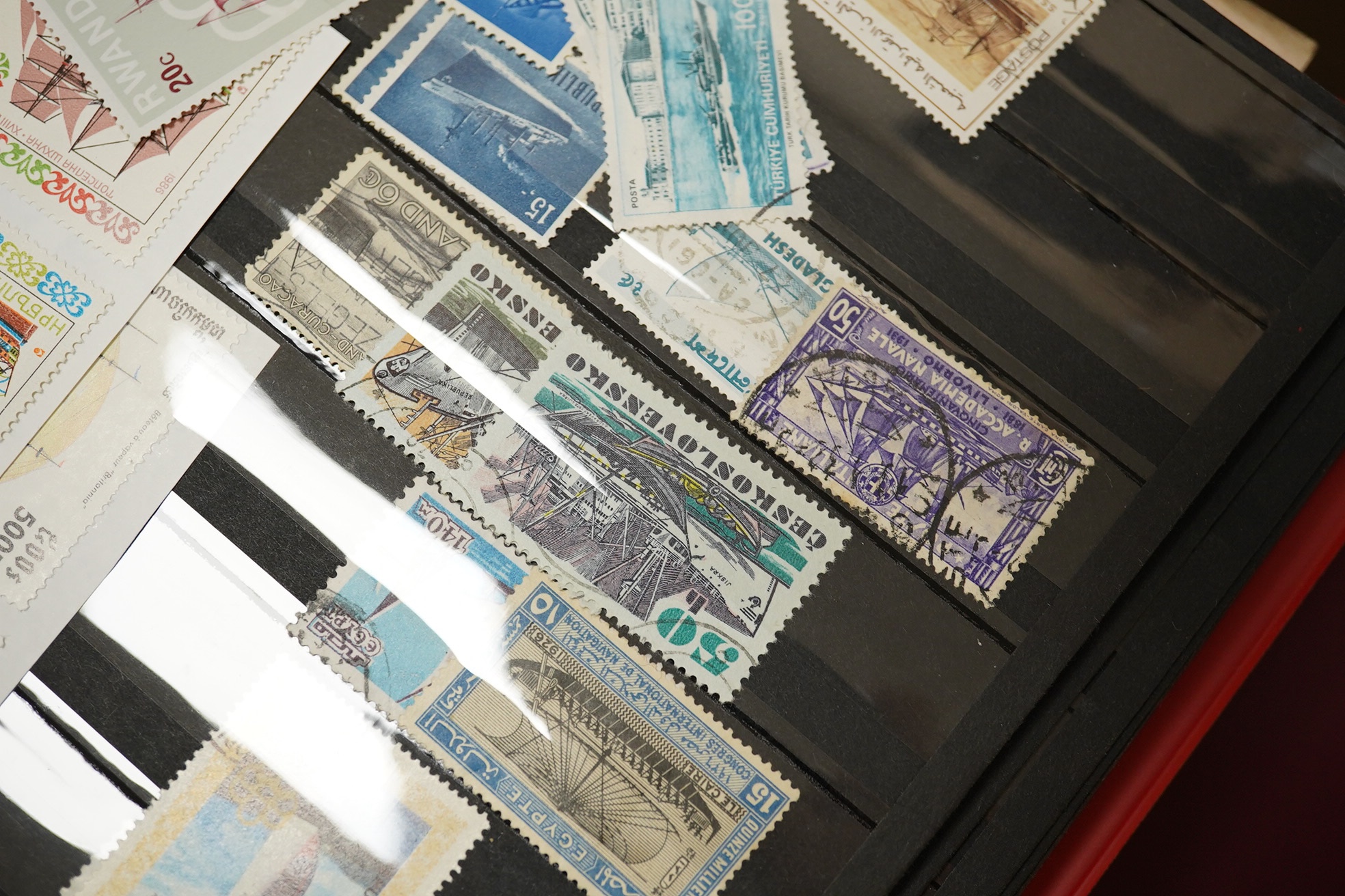 A collection of mostly British stamps in stock books including Mint, Definitives etc.